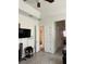 Spacious living room with hard wood flooring and decorative french doors at 619 Tapatio Ln, Kissimmee, FL 34759