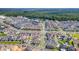 Expansive aerial view of the community, highlighting the variety of homes and landscaping at 783 Celebration Ave # 783, Celebration, FL 34747