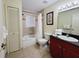 Full bathroom with tub, shower, and ample counter space at 8125 Resort Village Dr # 5310, Orlando, FL 32821