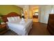 Bright main bedroom with king bed, en-suite bathroom, and relaxing ambiance at 8125 Resort Village Dr # 5310, Orlando, FL 32821