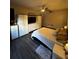 Modern bedroom with hardwood floors, plenty of closet space, and overhead fan at 911 N Orange Ave # 142, Orlando, FL 32801