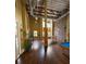 Spacious common area with exposed ductwork, pool table, and modern accents at 911 N Orange Ave # 142, Orlando, FL 32801