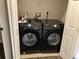 A laundry closet features a dark Samsung washer and dryer at 911 N Orange Ave # 142, Orlando, FL 32801