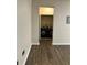 A view of the laundry closet from an adjacent room at 911 N Orange Ave # 142, Orlando, FL 32801
