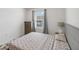 This bedroom features a window, dresser, lamp, and a patterned duvet set at 916 Grandin St, Davenport, FL 33837