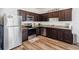 Modern kitchen with stainless steel appliances and ample counter space at 916 Grandin St, Davenport, FL 33837