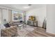 Bright living room with modern decor and wood-look flooring at 916 Grandin St, Davenport, FL 33837