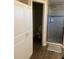 Bathroom featuring a walk-in shower with tiled walls at 11115 Sw 54Th Cir, Ocala, FL 34476