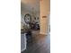 Open concept kitchen with granite countertops and breakfast bar flowing into the dining area at 11115 Sw 54Th Cir, Ocala, FL 34476