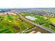 A beautiful community golf course featuring green fairways and perfectly placed water hazards at 1137 Drop Ln # 1137, Davenport, FL 33896