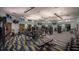 Bright gym featuring modern workout equipment on a colorful, wavy carpet at 1137 Drop Ln # 1137, Davenport, FL 33896