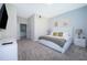 Serene main bedroom with a plush bed, neutral tones, and an ensuite bathroom at 1137 Drop Ln # 1137, Davenport, FL 33896
