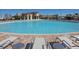 Resort-style community pool featuring ample seating and clubhouse in a pristine, well-maintained environment at 1137 Drop Ln # 1137, Davenport, FL 33896