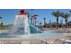 Outdoor water park with splash bucket and water slide, perfect for Gathering fun at 1137 Drop Ln # 1137, Davenport, FL 33896