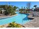 Close up of lazy river in the community with relaxing water features and palm trees at 1432 Rolling Fairway Dr, Davenport, FL 33896