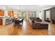 Open concept living space with seamless flow between living, dining, and kitchen areas at 1432 Rolling Fairway Dr, Davenport, FL 33896