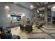 Bright lobby with high ceilings, elegant light fixtures, and comfortable seating areas, perfect for gatherings at 1432 Rolling Fairway Dr, Davenport, FL 33896