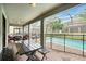 Inviting covered patio with comfortable seating, and a view of the sparkling pool area at 1432 Rolling Fairway Dr, Davenport, FL 33896