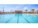 Enjoy the community's Olympic-sized pool, perfect for swimming laps or lounging in the sun at 1432 Rolling Fairway Dr, Davenport, FL 33896