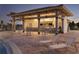 Resort-style covered outdoor bar with ample seating next to a spacious pool and relaxing chaise lounges at 1432 Rolling Fairway Dr, Davenport, FL 33896