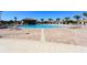Relax at this community's resort-style pool with shaded cabanas and plenty of seating for lounging at 1432 Rolling Fairway Dr, Davenport, FL 33896