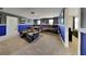 Spacious home theater featuring tiered seating and immersive entertainment experience at 1432 Rolling Fairway Dr, Davenport, FL 33896