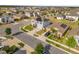 Aerial view of home in a residential community, equipped with solar panels at 204 Taft Dr, Davenport, FL 33837