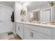 Bathroom featuring double vanity with white cabinetry and a large mirror at 204 Taft Dr, Davenport, FL 33837