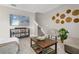 Stylish living room with a comfortable sectional sofa, modern decor, and a large TV for entertainment at 204 Taft Dr, Davenport, FL 33837