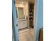 Modern bathroom features double sinks, granite countertops, and updated fixtures at 2040 Milkweed St, Ocoee, FL 34761