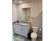 Bathroom featuring a granite countertop vanity and modern fixtures at 2040 Milkweed St, Ocoee, FL 34761