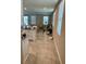 Bright and open-concept living space with tile flooring, and a large window at 2040 Milkweed St, Ocoee, FL 34761