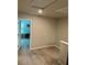 Loft featuring neutral carpeting and natural light, perfect for a flexible living space at 2040 Milkweed St, Ocoee, FL 34761