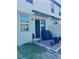 Backyard view showcases the outdoor patio with a grill, small garden and sliding glass door access at 2040 Milkweed St, Ocoee, FL 34761