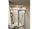 Modern bathroom featuring a glass shower door and rain style shower head at 2040 Milkweed St, Ocoee, FL 34761