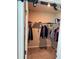 Walk-in closet featuring shelving and hanging rods at 2040 Milkweed St, Ocoee, FL 34761