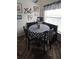 Cozy breakfast nook with table and built-in bench seating beneath natural lighting from adjacent windows at 205 Lexingdale Dr, Orlando, FL 32828