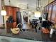 Well-equipped kitchen with dark wood cabinets, black countertops, and modern appliances at 205 Lexingdale Dr, Orlando, FL 32828