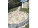 Beautifully landscaped patio with pavers, perfect for outdoor entertaining and relaxation at 205 Lexingdale Dr, Orlando, FL 32828