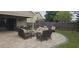 Inviting patio with outdoor seating, perfect for relaxing and entertaining guests in the backyard at 205 Lexingdale Dr, Orlando, FL 32828