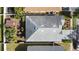 Aerial view showcasing the home's roof, surrounding yard, and neighborhood at 2102 Congress Ln, St Cloud, FL 34769