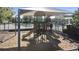 Playground with shade cover adjacent to community pool area at 2102 Congress Ln, St Cloud, FL 34769