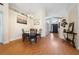 Dining area with wood floors, natural light and views of the entryway at 2150 Flintlock Blvd, Kissimmee, FL 34743