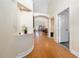 Inviting foyer showcasing archway details and seamlessly connecting the living spaces at 2150 Flintlock Blvd, Kissimmee, FL 34743