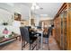 Kitchen with eating area, tile floors, and seamless transition to the living area at 2150 Flintlock Blvd, Kissimmee, FL 34743