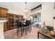 Eat-in kitchen area with tile floors leads to screened lanai, offering indoor-outdoor living at 2150 Flintlock Blvd, Kissimmee, FL 34743