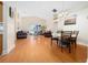 Spacious living room and dining area with lots of natural light and wood floors at 2150 Flintlock Blvd, Kissimmee, FL 34743