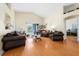 Living room area with lots of natural light and wood floors at 2150 Flintlock Blvd, Kissimmee, FL 34743