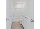 Bathroom featuring a tub with a shower head, a toilet, and a granite countertop sink at 2188 Tay Wes Dr, St Cloud, FL 34771