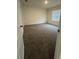 A spacious bedroom with neutral walls and carpet flooring, awaiting personalization at 2755 Gentle Rain Dr, Davenport, FL 33837